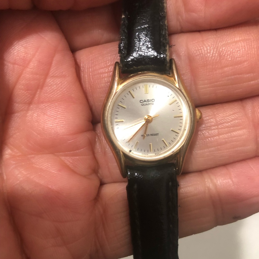 Casio Quartz Gold and Black Watch